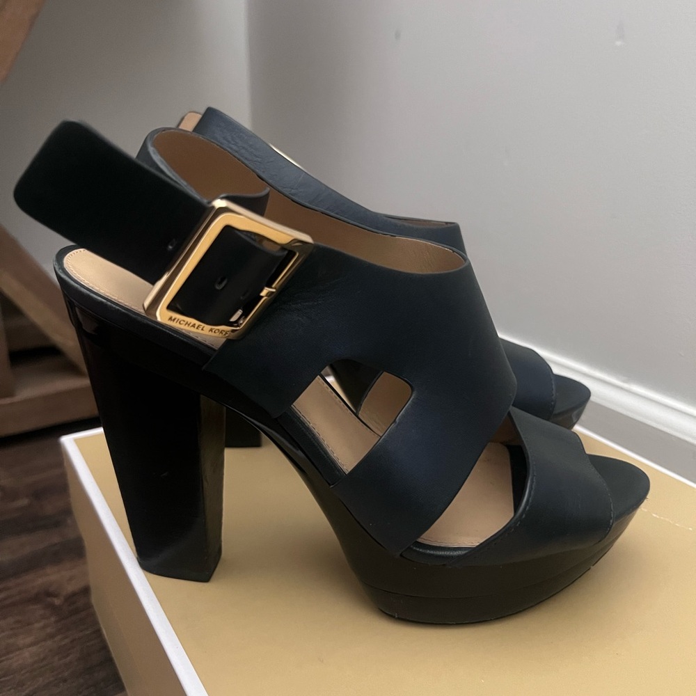 Pre owned Michael Kors Black Leather Platform Heels, no original box included.